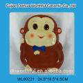 Beautiful ceramic plate in monkey shape